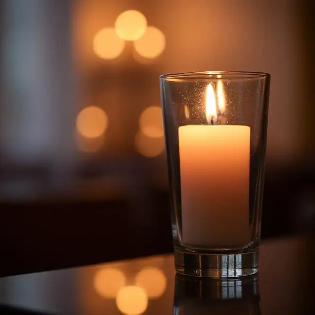 Candlelight reflecting on a glass